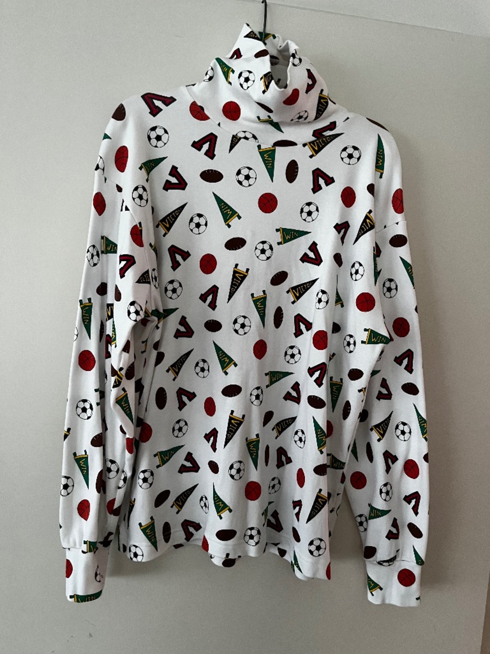 Multi sport themed turtleneck